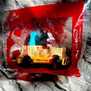 Minnie mouse at the dinosaur attraction Walt Disney 50th anniversary collectible